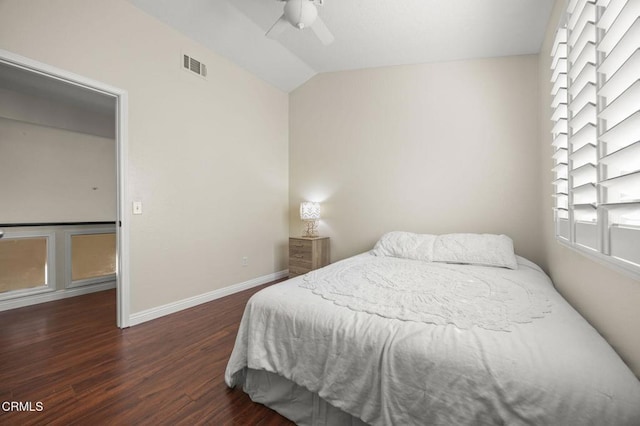 7748 Paso Robles St, Ventura, CA 93004 - bedroom with dark wood finished floors, vaulted ceiling, multiple windows, and ceiling fan