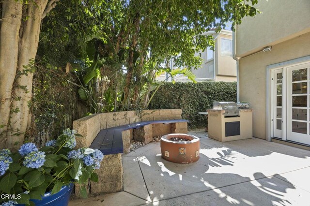 7748 Paso Robles St, Ventura, CA 93004 - view of patio / terrace with an outdoor fire pit