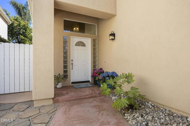 7748 Paso Robles St, Ventura, CA 93004 - doorway to property featuring stucco siding