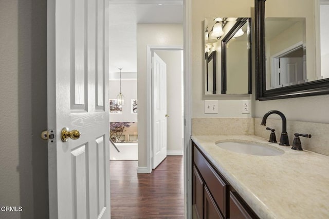 7748 Paso Robles St, Ventura, CA 93004 - bathroom with wood finished floors and vanity