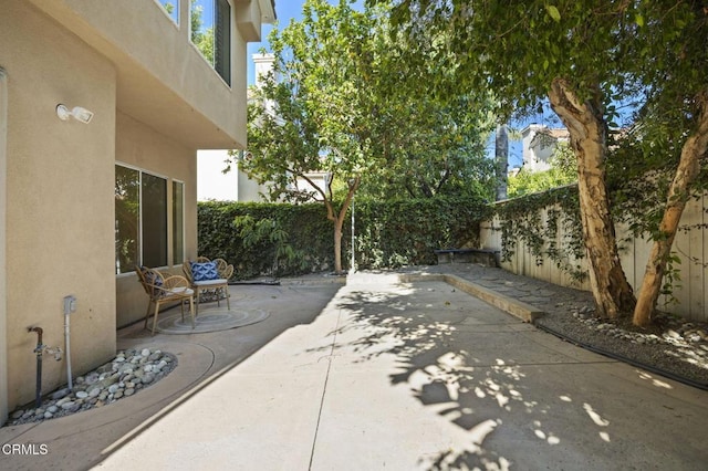 7748 Paso Robles St, Ventura, CA 93004 - fenced backyard featuring a patio area