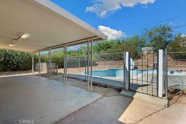 15722 Inyo St, Victorville, CA 92395 - view of swimming pool with a patio area
