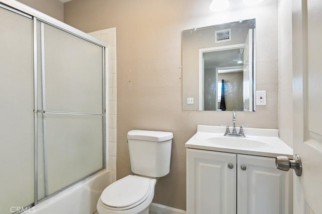 15722 Inyo St, Victorville, CA 92395 - full bathroom with vanity, shower / bath combination with glass door, and a textured wall