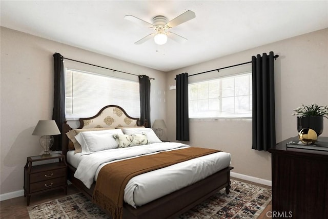 15722 Inyo St, Victorville, CA 92395 - bedroom featuring multiple windows, ceiling fan, and wood finished floors