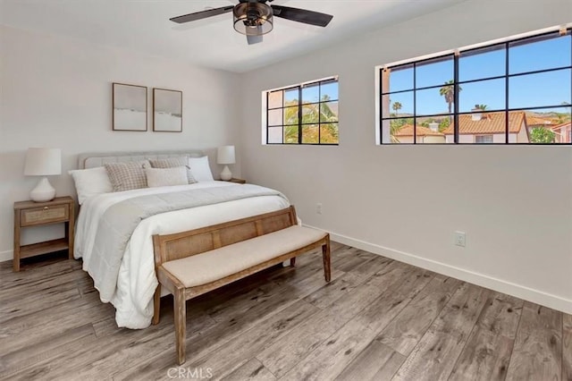 3010 Rosalinda Unit 50, San Clemente, CA 92673 - bedroom with wood finished floors and ceiling fan
