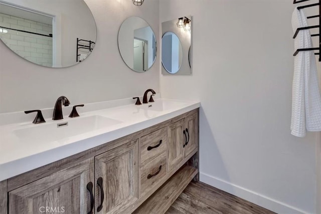 3010 Rosalinda Unit 50, San Clemente, CA 92673 - full bath featuring double vanity and wood finished floors