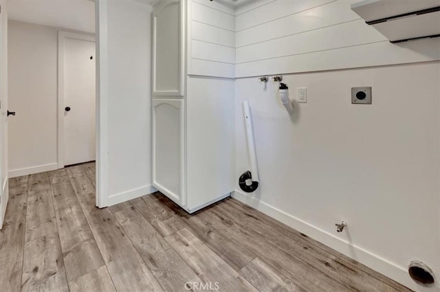 3010 Rosalinda Unit 50, San Clemente, CA 92673 - laundry area with electric dryer hookup, light wood-style flooring, and hookup for a gas dryer