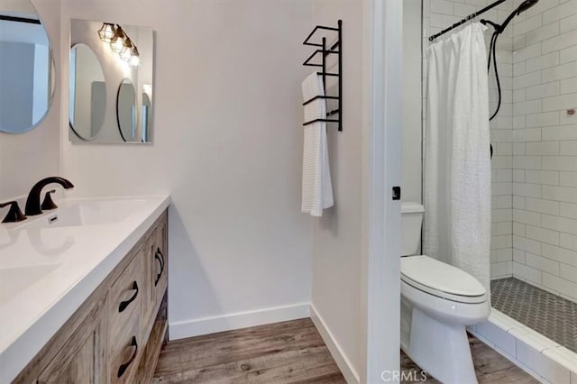 3010 Rosalinda Unit 50, San Clemente, CA 92673 - full bath featuring double vanity, wood finished floors, and a tile shower