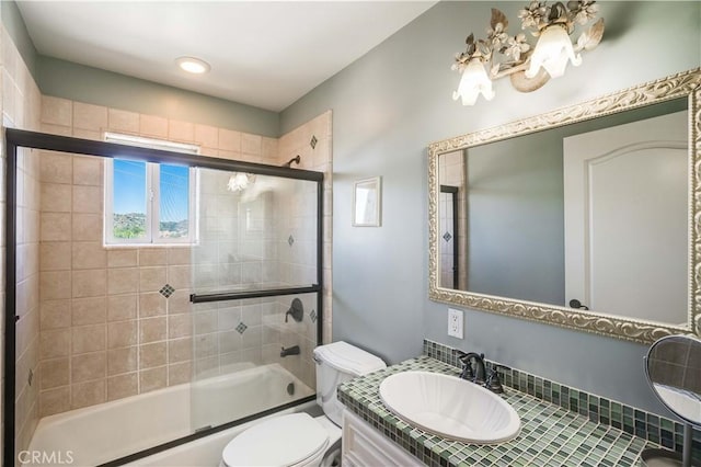 21460 Arapahoe Trl, Chatsworth, CA 91311 - full bathroom with bath / shower combo with glass door and vanity