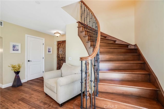21460 Arapahoe Trl, Chatsworth, CA 91311 - stairway featuring wood finished floors and baseboards