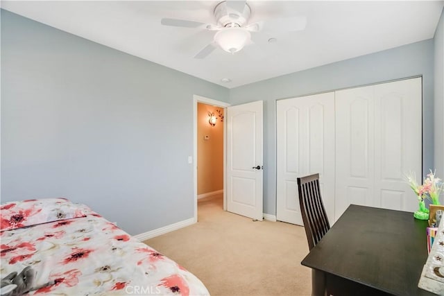 21460 Arapahoe Trl, Chatsworth, CA 91311 - bedroom with light colored carpet, a closet, and ceiling fan