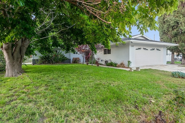 22017 Bryant St, West Hills, CA 91304 - view of front of property with stucco siding, a garage, and driveway