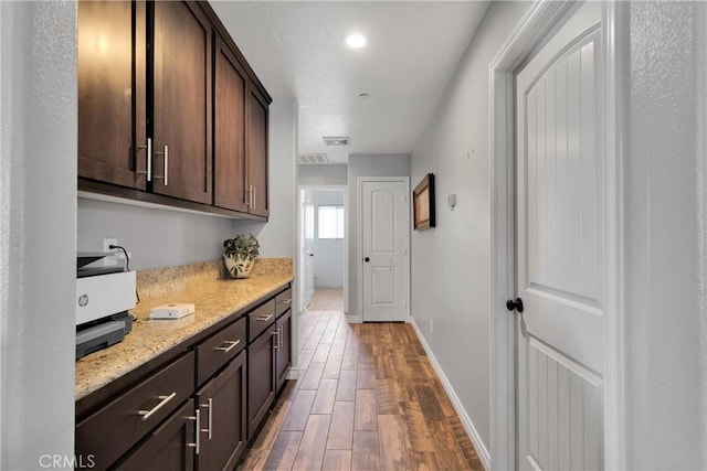 9512 Mesquite St, Phelan, CA 92371 - washroom with dark wood-style flooring and baseboards