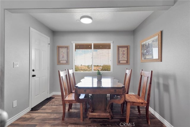 9512 Mesquite St, Phelan, CA 92371 - dining space featuring dark wood-type flooring and baseboards
