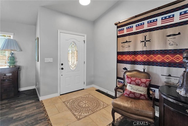 9512 Mesquite St, Phelan, CA 92371 - foyer with baseboards and tile patterned floors