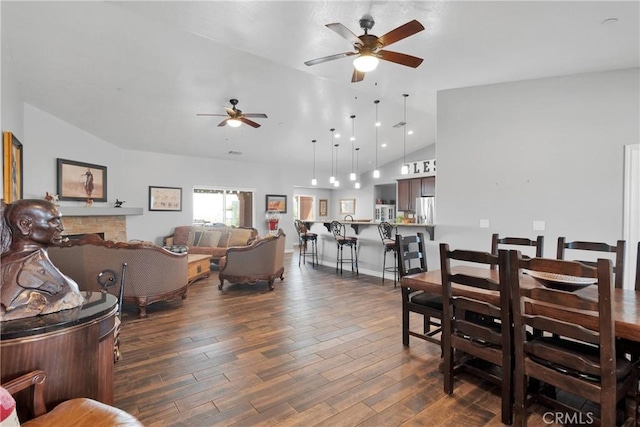 9512 Mesquite St, Phelan, CA 92371 - living room featuring lofted ceiling, a ceiling fan, and dark wood-style flooring