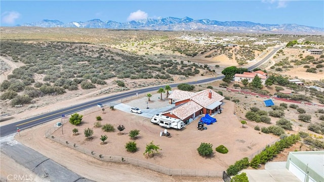9512 Mesquite St, Phelan, CA 92371 - aerial view of sparsely populated area with a desert landscape and a mountainous background