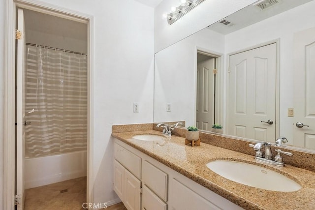 27597 Lafayette Way, Moreno Valley, CA 92555 - bathroom featuring double vanity, shower / tub combo, and tile patterned flooring