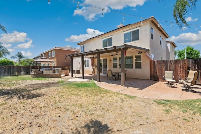 27597 Lafayette Way, Moreno Valley, CA 92555 - rear view of house with stucco siding, a fenced backyard, a ceiling fan, and a patio area