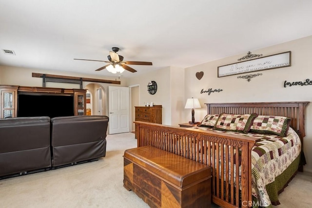 27597 Lafayette Way, Moreno Valley, CA 92555 - bedroom featuring light colored carpet, a ceiling fan, and arched walkways