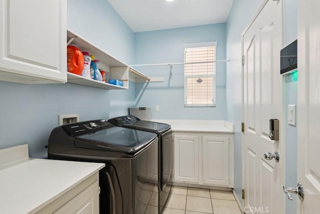 27597 Lafayette Way, Moreno Valley, CA 92555 - laundry area featuring cabinet space, washer and clothes dryer, and light tile patterned floors