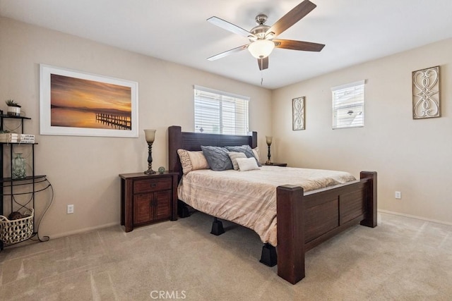 27597 Lafayette Way, Moreno Valley, CA 92555 - bedroom with multiple windows, light carpet, and ceiling fan