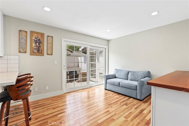 3420 Marna Ave, Long Beach, CA 90808 - living room with light wood-style flooring and recessed lighting