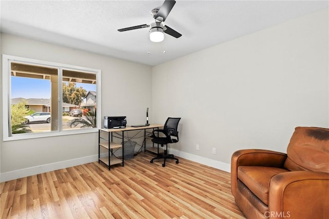 3420 Marna Ave, Long Beach, CA 90808 - home office with light wood-style flooring and a ceiling fan