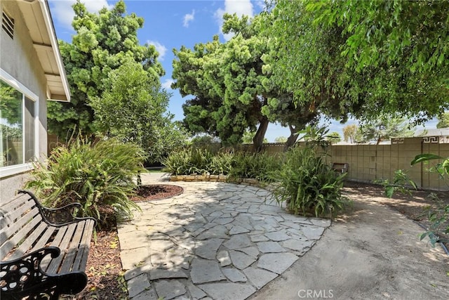 3420 Marna Ave, Long Beach, CA 90808 - fenced backyard with a patio