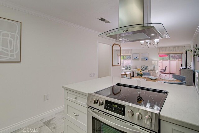 3130 Via Serena N Unit B, Laguna Woods, CA 92637 - kitchen featuring electric range, range hood, light marble finish floors, light countertops, and a chandelier