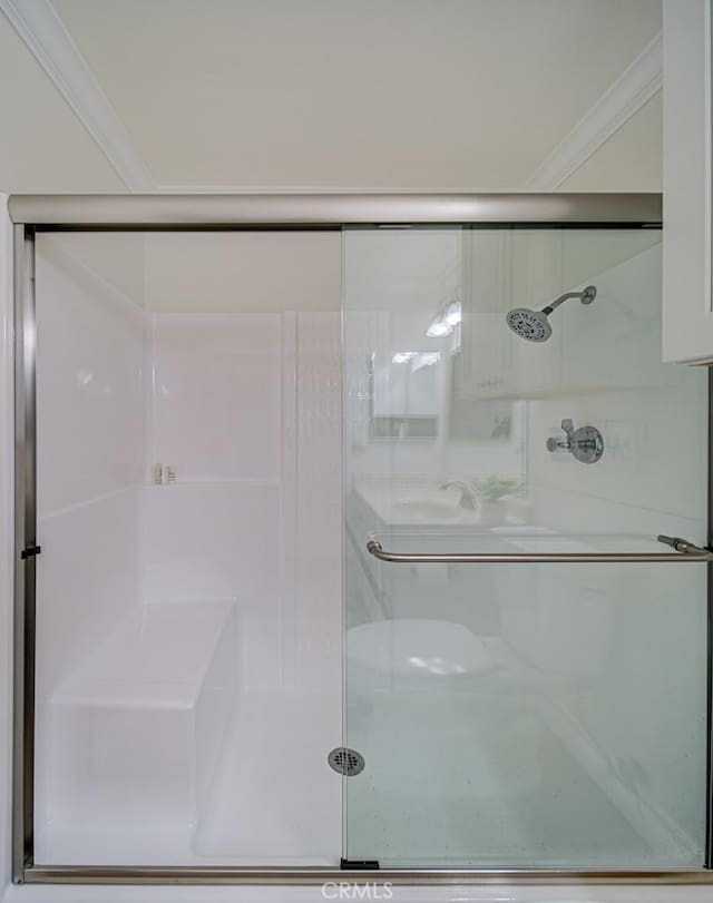 3130 Via Serena N Unit B, Laguna Woods, CA 92637 - full bathroom featuring a stall shower and ornamental molding