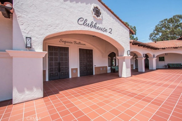 3130 Via Serena N Unit B, Laguna Woods, CA 92637 - doorway to property with stucco siding and a tiled roof