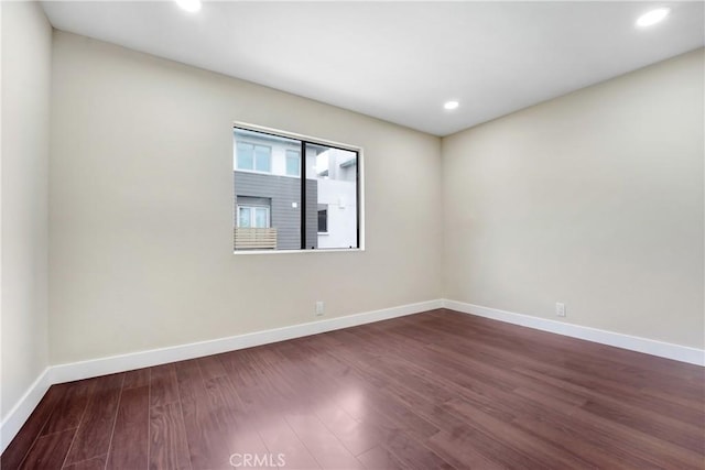 2473 Oswego St Unit 17, Pasadena, CA 91107 - unfurnished room featuring dark wood-style flooring and recessed lighting