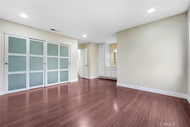2473 Oswego St Unit 17, Pasadena, CA 91107 - unfurnished living room with dark wood-style floors and recessed lighting