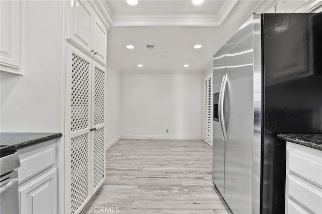 2720 Hilltop Dr Unit 58, Newport Beach, CA 92660 - kitchen with stainless steel fridge, crown molding, white cabinetry, recessed lighting, and dark stone countertops