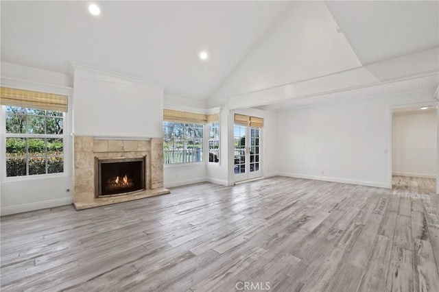 2720 Hilltop Dr Unit 58, Newport Beach, CA 92660 - unfurnished living room featuring recessed lighting, a tile fireplace, light wood finished floors, and high vaulted ceiling