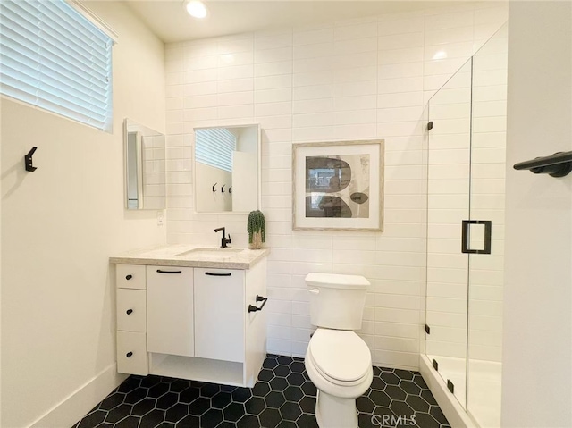 753 Site Dr, Brea, CA 92821 - full bathroom featuring vanity, a shower stall, tile walls, and tile patterned flooring