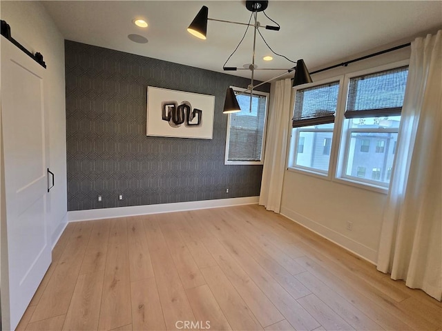 753 Site Dr, Brea, CA 92821 - unfurnished dining area featuring light wood-type flooring, an accent wall, and recessed lighting