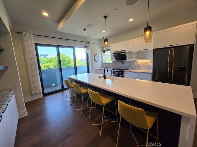 753 Site Dr, Brea, CA 92821 - kitchen featuring refrigerator with ice dispenser, modern cabinets, dark wood-style flooring, white cabinetry, and backsplash