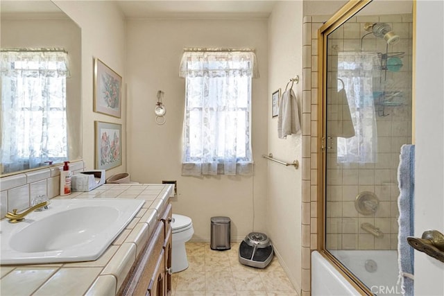 19428 Shasta Rd, Apple Valley, CA 92307 - bathroom with vanity and shower / bath combination with glass door