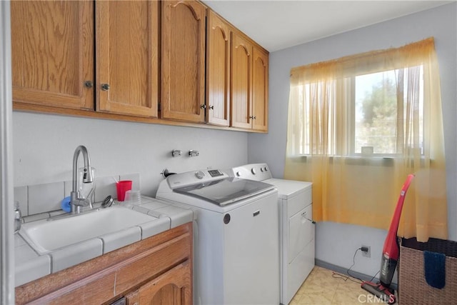 19428 Shasta Rd, Apple Valley, CA 92307 - laundry area featuring cabinet space and washer and dryer
