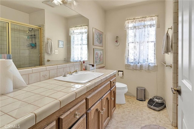 19428 Shasta Rd, Apple Valley, CA 92307 - bathroom featuring healthy amount of natural light, vanity, and a shower stall