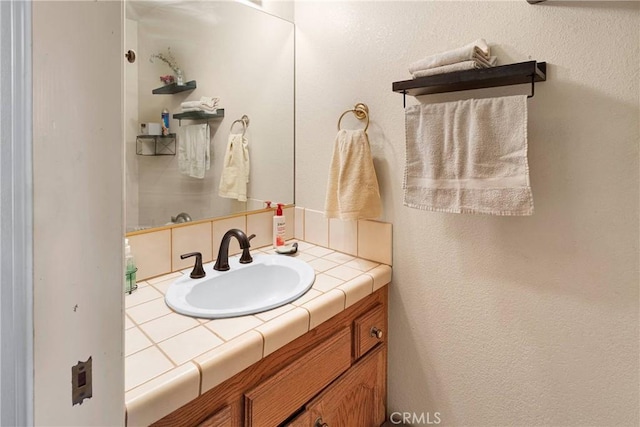 19428 Shasta Rd, Apple Valley, CA 92307 - bathroom featuring vanity and a textured wall