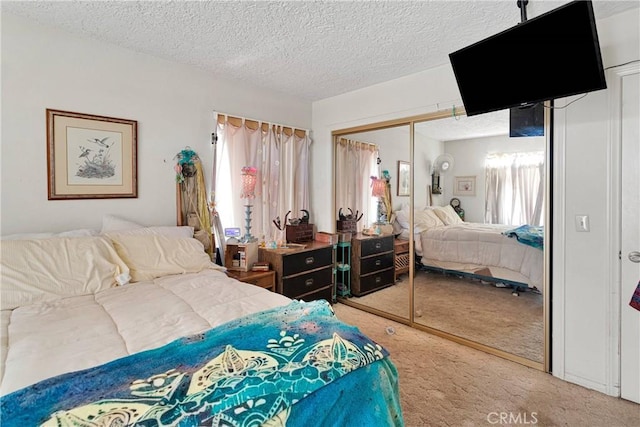 19428 Shasta Rd, Apple Valley, CA 92307 - carpeted bedroom with a textured ceiling and a closet