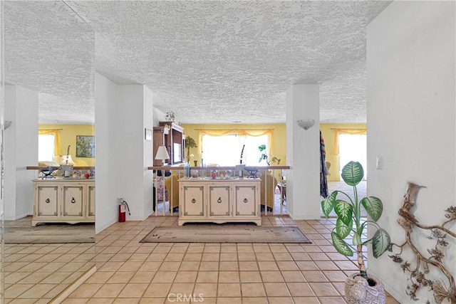 19428 Shasta Rd, Apple Valley, CA 92307 - living area featuring light tile patterned floors and a textured ceiling