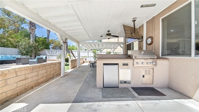 18223 Shannon Ridge Pl, Canyon Country, CA 91387 - fenced backyard featuring an outdoor living space, a ceiling fan, exterior kitchen, and a patio