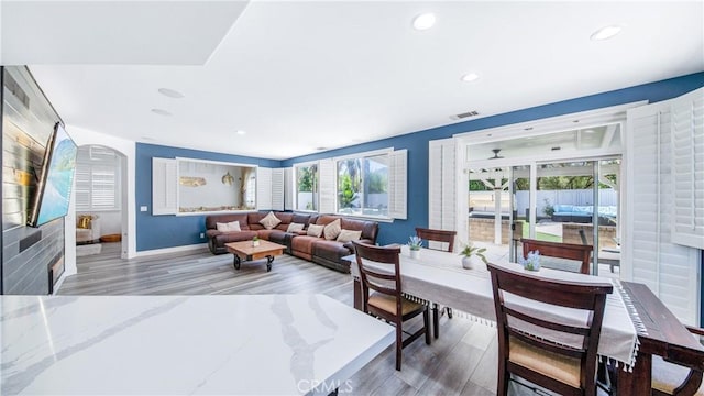 18223 Shannon Ridge Pl, Canyon Country, CA 91387 - living area featuring wood finished floors, recessed lighting, and arched walkways