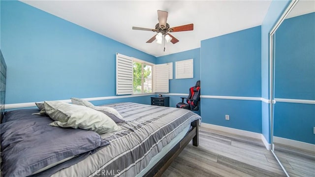 18223 Shannon Ridge Pl, Canyon Country, CA 91387 - bedroom featuring wood finished floors, a closet, and a ceiling fan