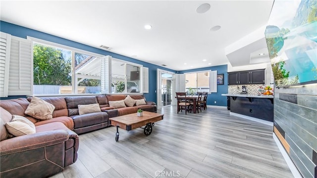 18223 Shannon Ridge Pl, Canyon Country, CA 91387 - living room featuring light wood-style flooring and recessed lighting