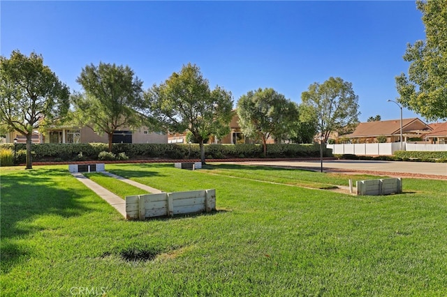 26853 Summer Sunshine Dr, Menifee, CA 92585 - view of property's community with a lawn